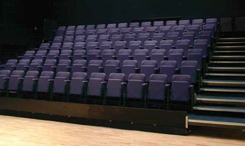 Raked blue seats in the John Thaw Studio Theatre