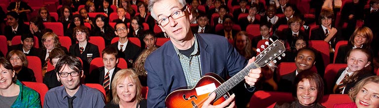 John Hegley with school groups in the Cosmo Rodewald Concert Hall